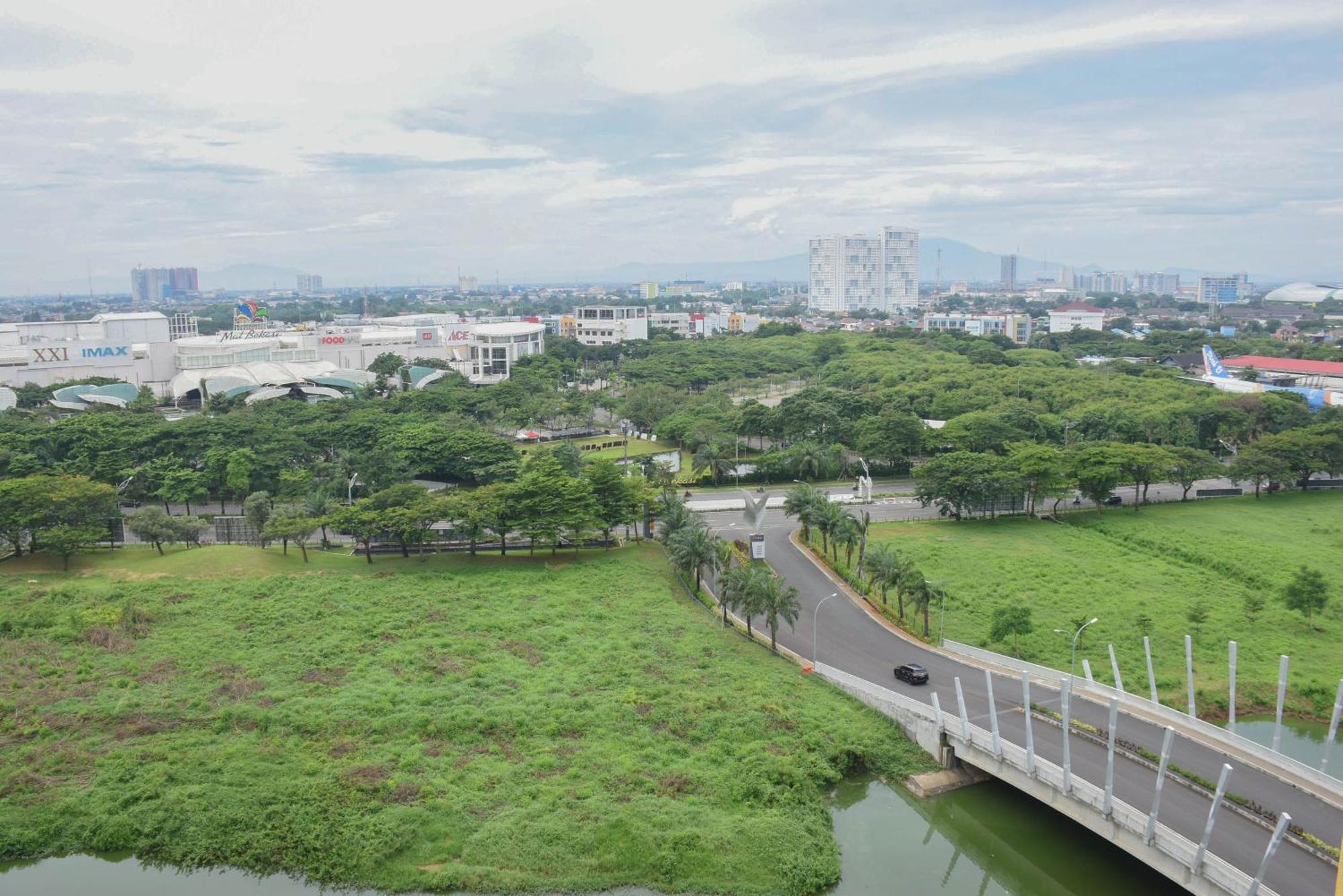 Minimalist At Springlake Summarecon By Travelio Apartemen